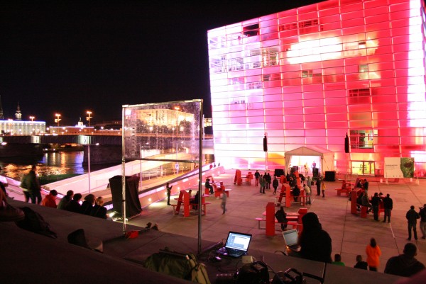 This picture shows the interface with the Ars Electronica Center in the background